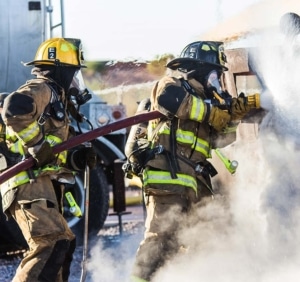firefighters putting out fire